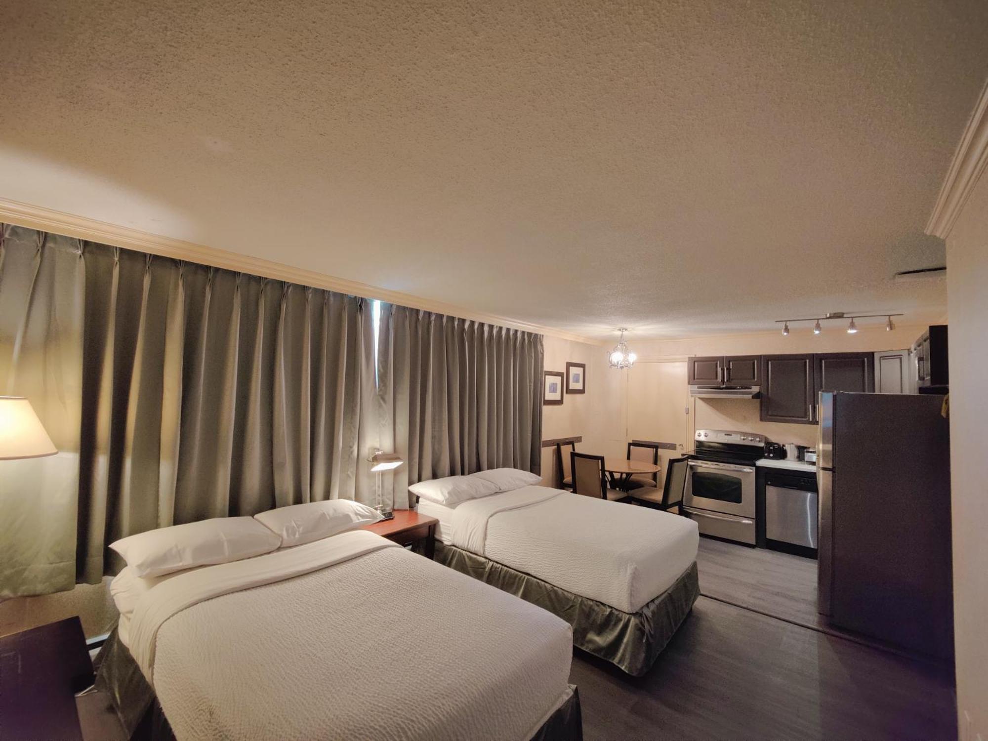 Divya Sutra Suites On Robson Downtown Ванкувер Экстерьер фото